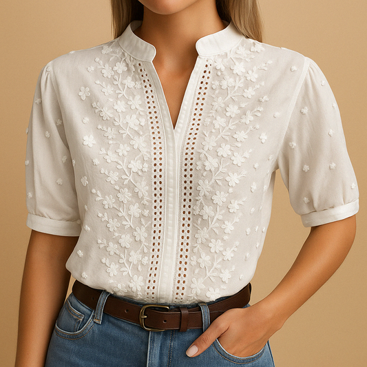Women’s white elegant blouse with classic collar and buttons, ideal for office days, casual outings, or an evening look.