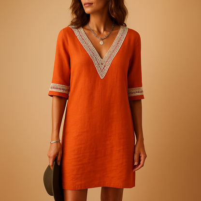 Summer V-neck dress for women with lace details and three-quarter sleeves, perfect for beach days and casual summer outings.