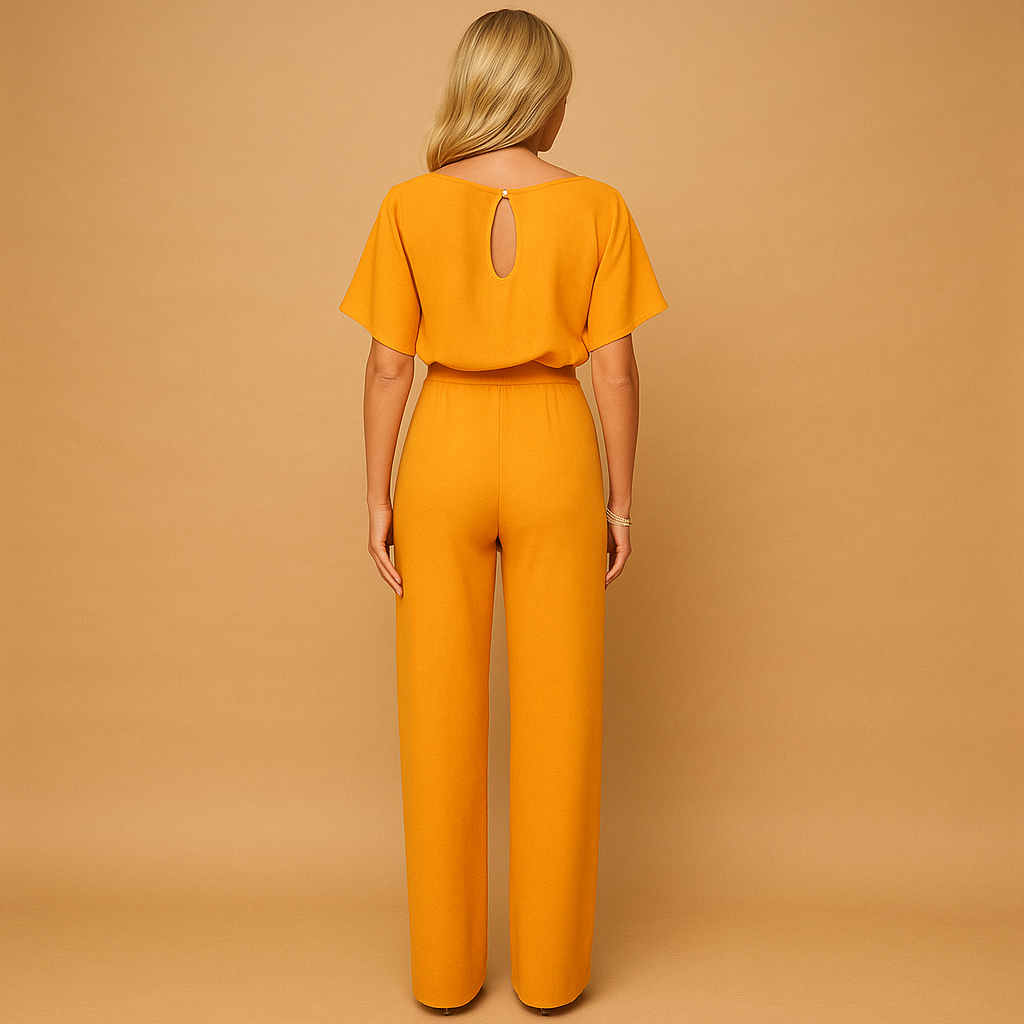 Women’s tailored jumpsuit with high waist and tie detail, available in black, navy, yellow, and apricot, ideal for work or casual chic styling.