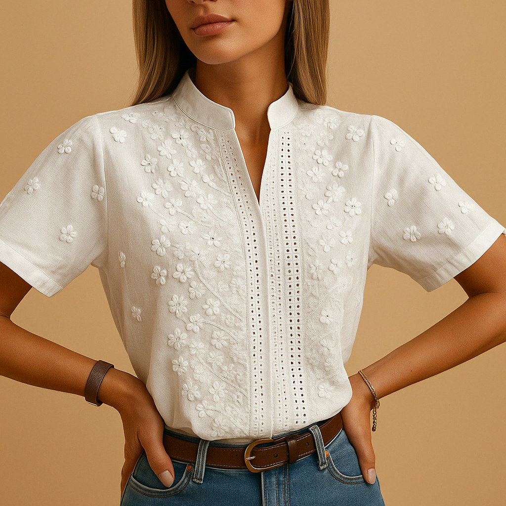 Women’s white elegant blouse with classic collar and buttons, ideal for office days, casual outings, or an evening look.