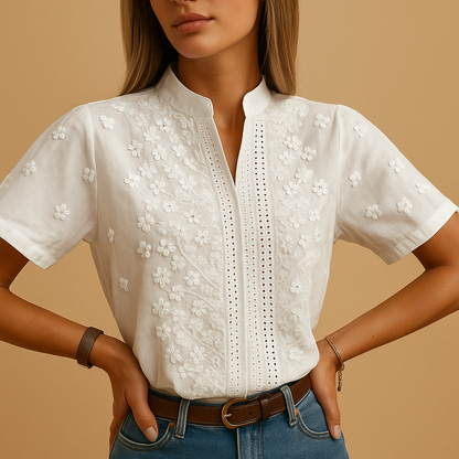 Women’s white elegant blouse with classic collar and buttons, ideal for office days, casual outings, or an evening look.